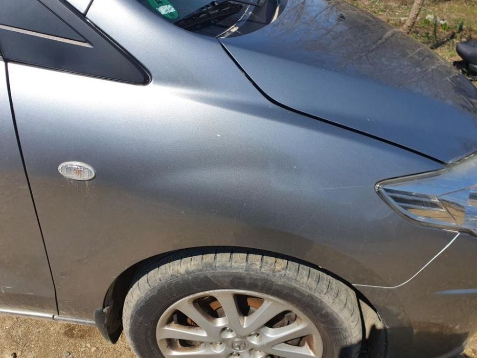 Aripa stanga Mazda 5 an 2005-2010