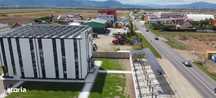 Teren comercial: clădiri birouri, spatii comerciale ,spalatorie, hale.