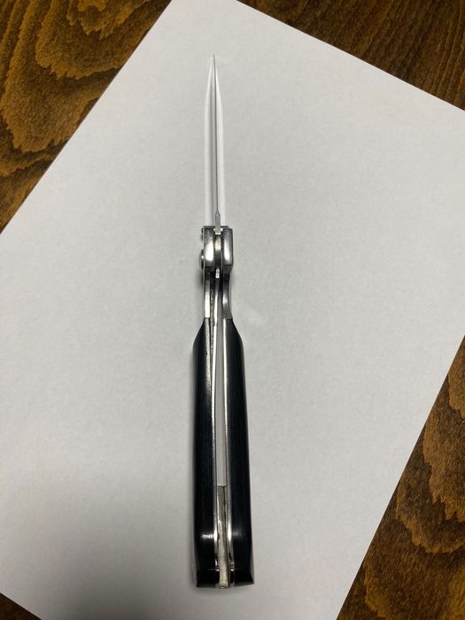 Сгъваем нож с текстилен калъф.