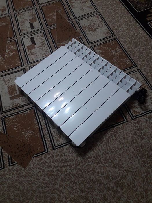 Радиатор бимиталл Б/У