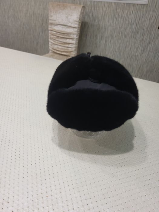 Шапку ушанку в отличном состояние