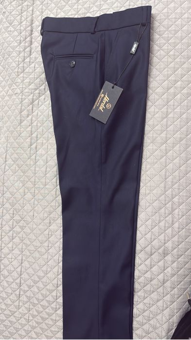 Продам новые,школьные, синие брюки,размер 9 лет,