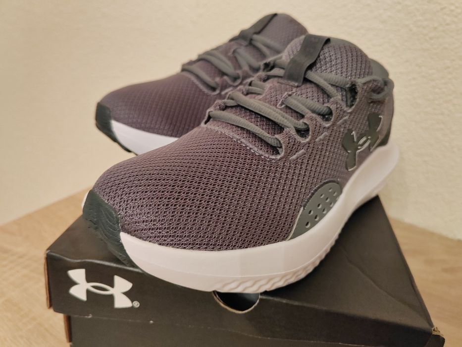 Under Armour model Charged Surge 4