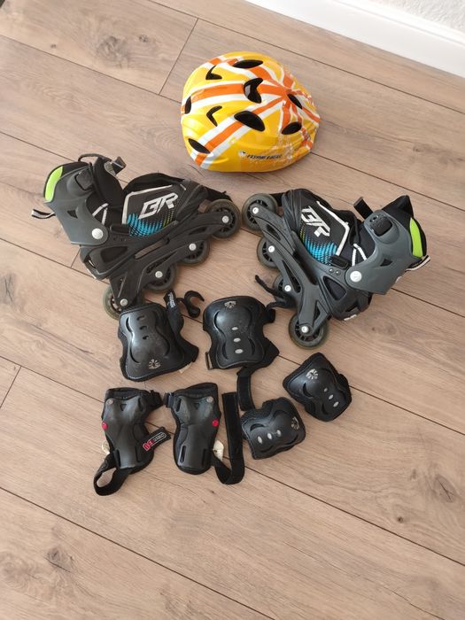 Роликовые коньки