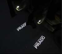 Prado 120 светящийся логотип подсветка в ноги фонарик Тойота проектор