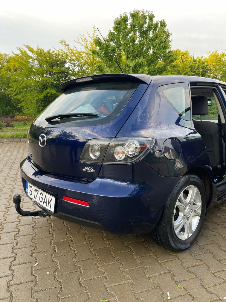 Mazda 3 1.6 MZR Sport Exclusive.