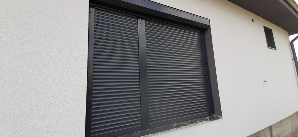 RULOURI Aluminiu si Usi de garaj rezidentiale SECTIONALE