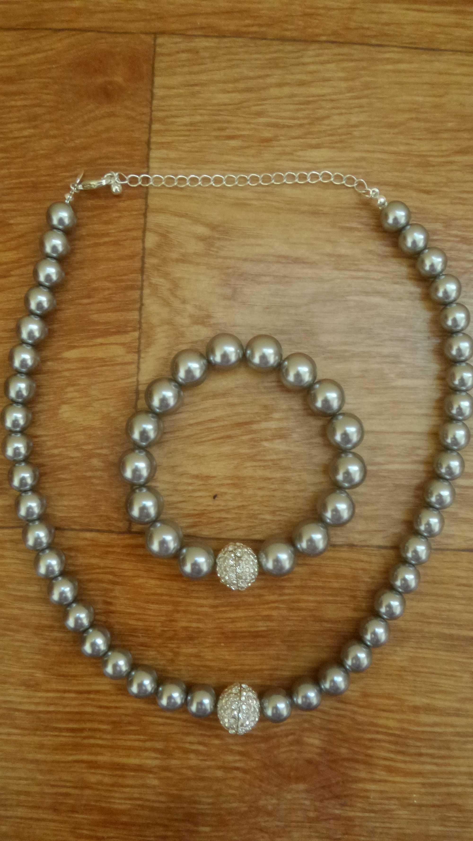 Новый комплект ожерелье с браслетом.