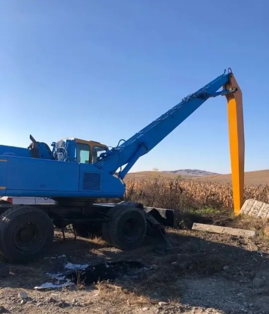 Atlas 1804 Excavator pe roți cu braț de 18 m