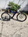 Bicicleta Mountain Bike full suspension Shimano.