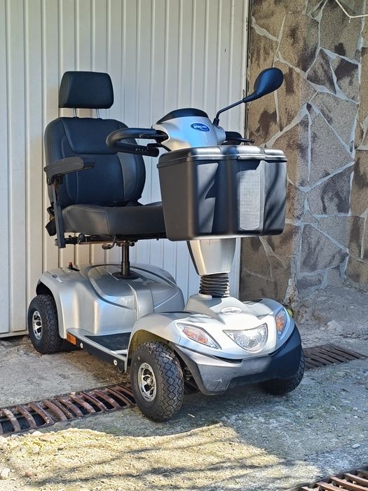 Carucior scuter electric scaun dizabilitati  carut tricieleta handicap