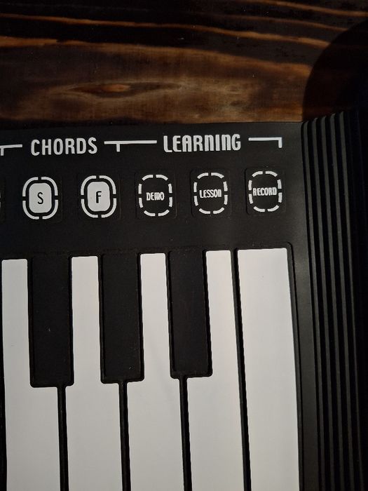 Hand roll piano.
