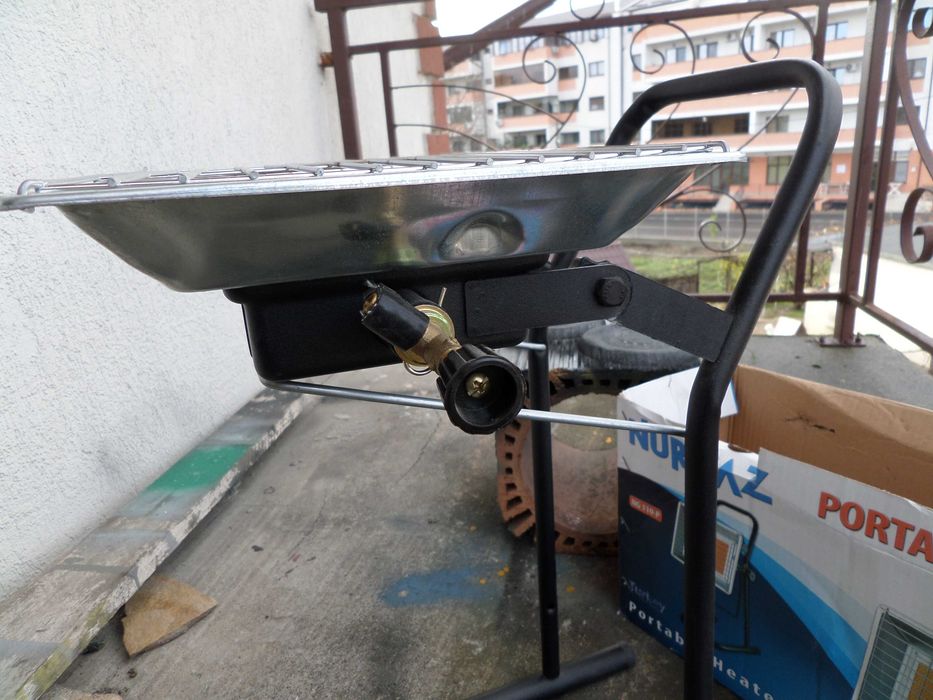 Incalzitor,soba,resou pe gaz cu suport, ceas de butelie, furtun, nou