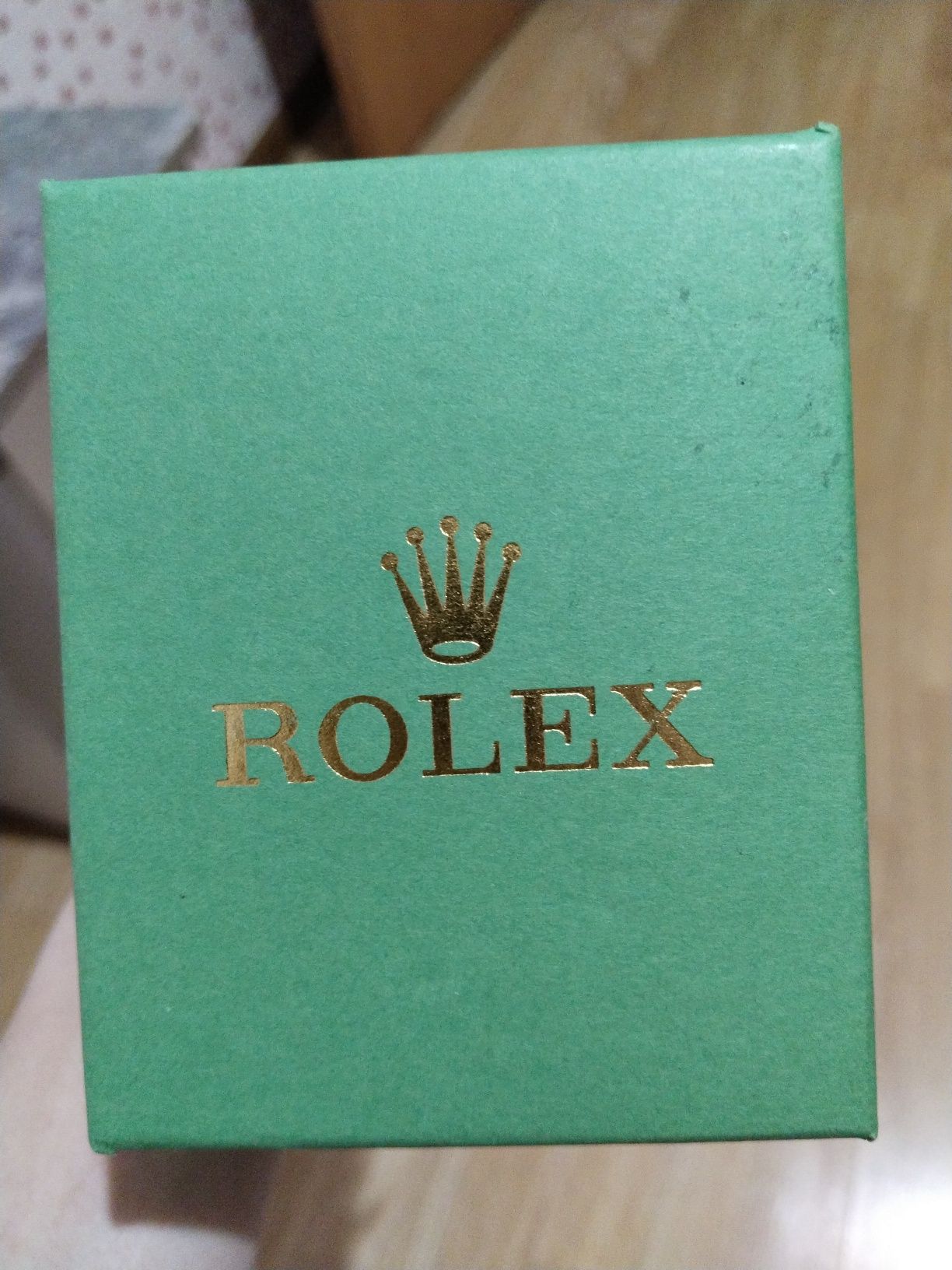 Часы Rolex золотистый