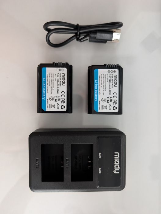 Зарядно + две батерии NP-FW50