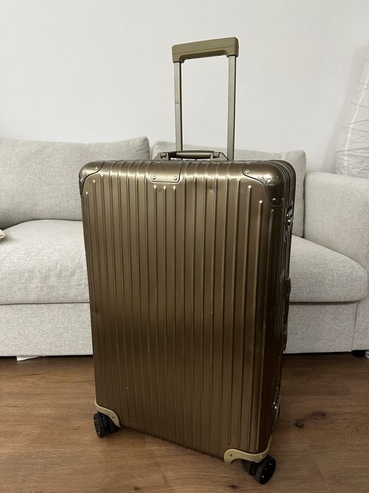 Troler cala Rimowa Gold Trunk folosit 5 zboruri