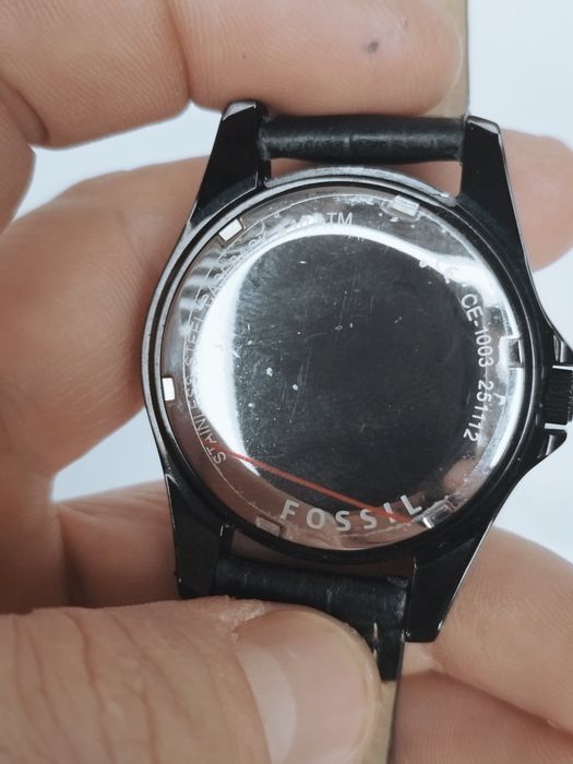 Ceas bărbătesc Fossil CE1003 ceramic, cu quartz si curea din piele.