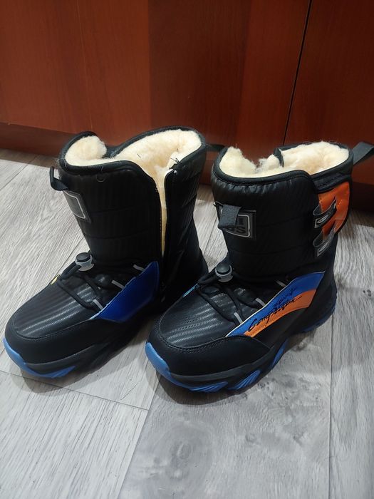 Продам новые зимние ботинки