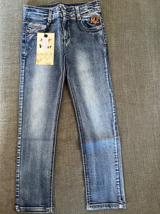 Нови панталони за момче