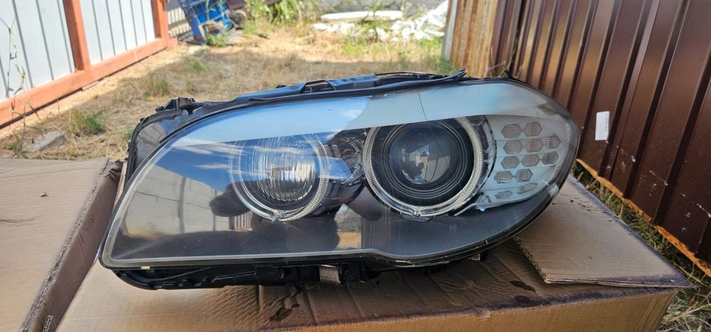 Faruri bmw f10 originale pret 4300 lei fix