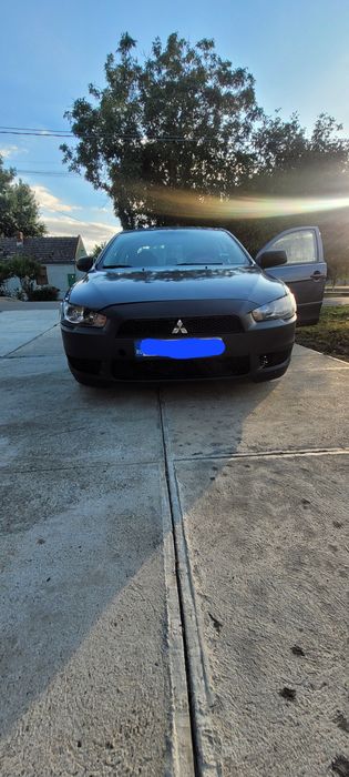 Vând mitsubishi lancer