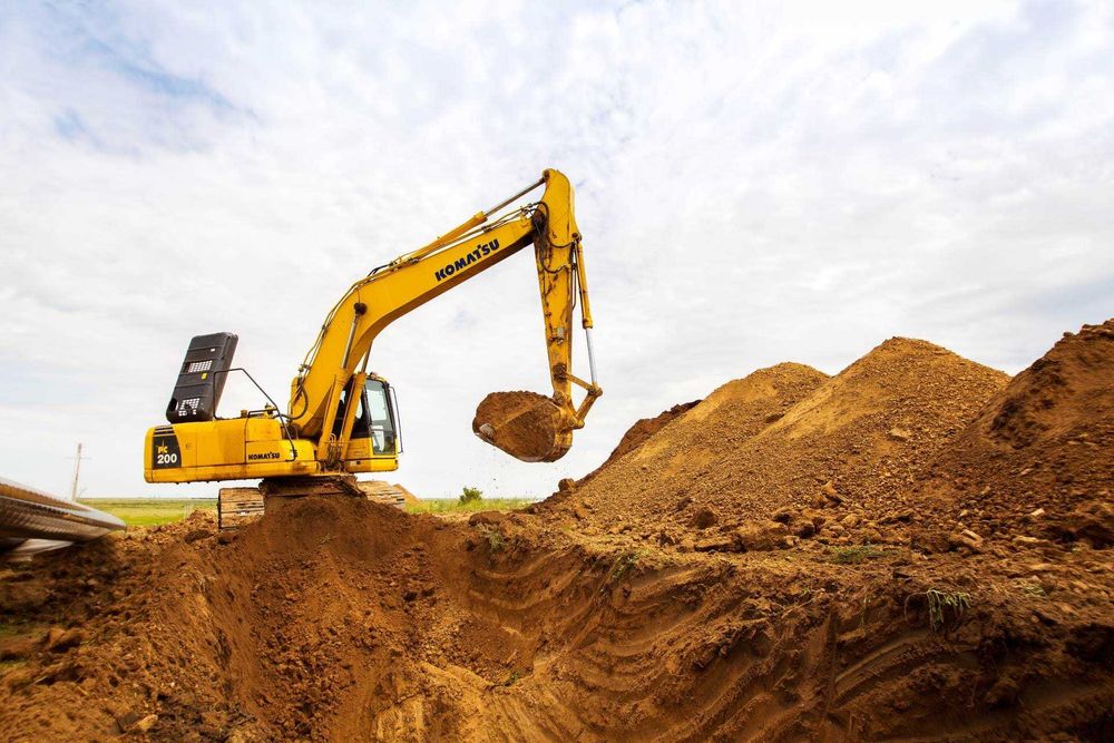 Копка котлована земляные работы уплотнение основания балласт tasyma.kz