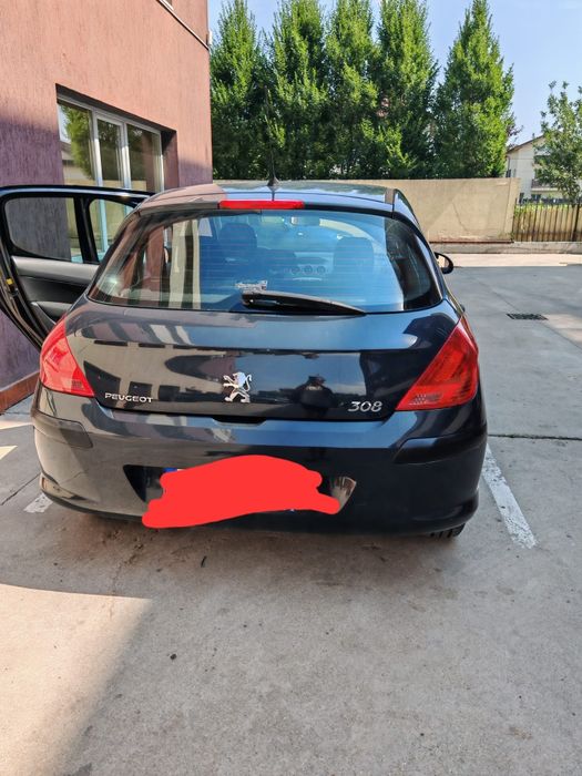 Peugeot 308 ,benzina 1,4 , an 2008