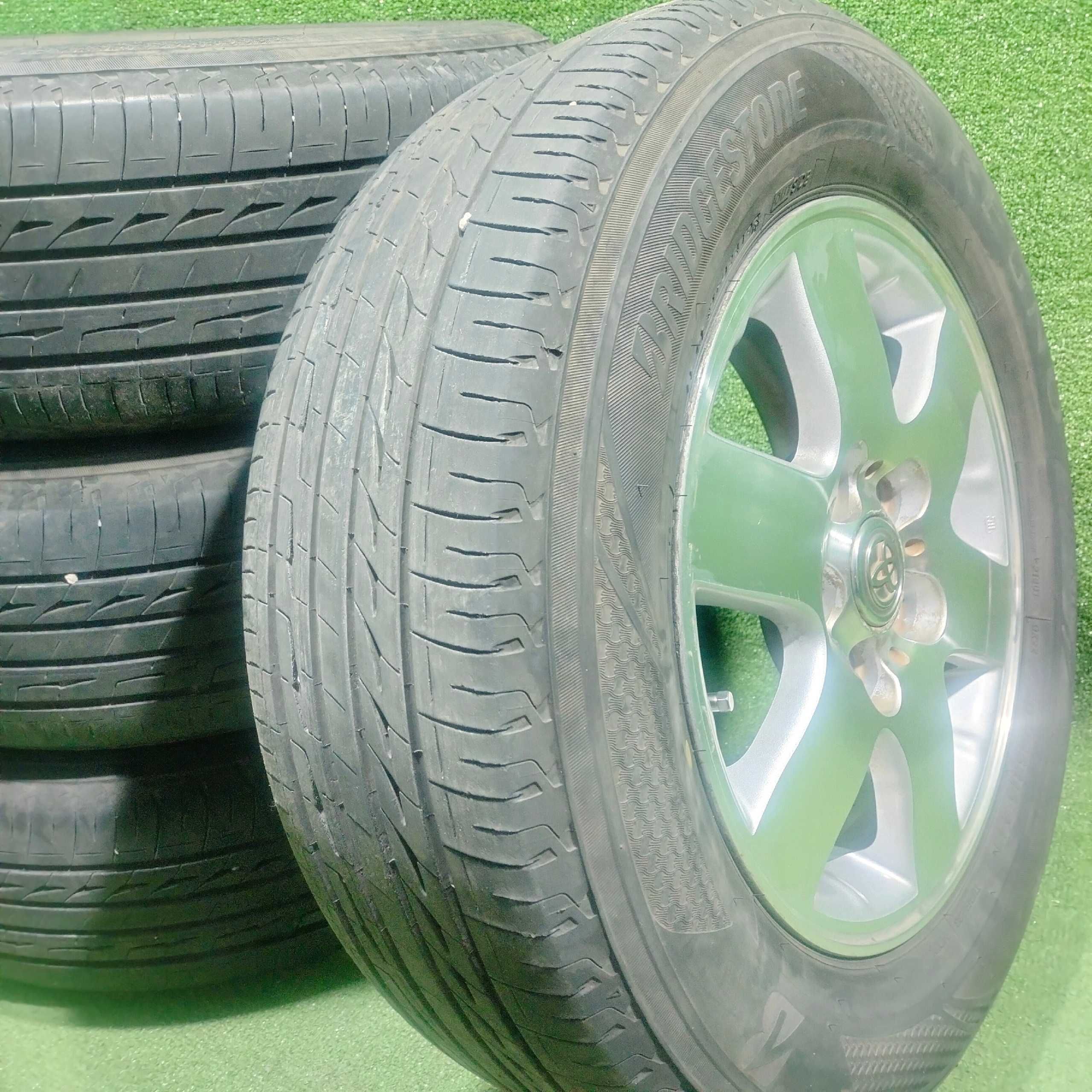 Продам Диск оригинал Toyota с шинами Bridgestone 205/65 R15 летний