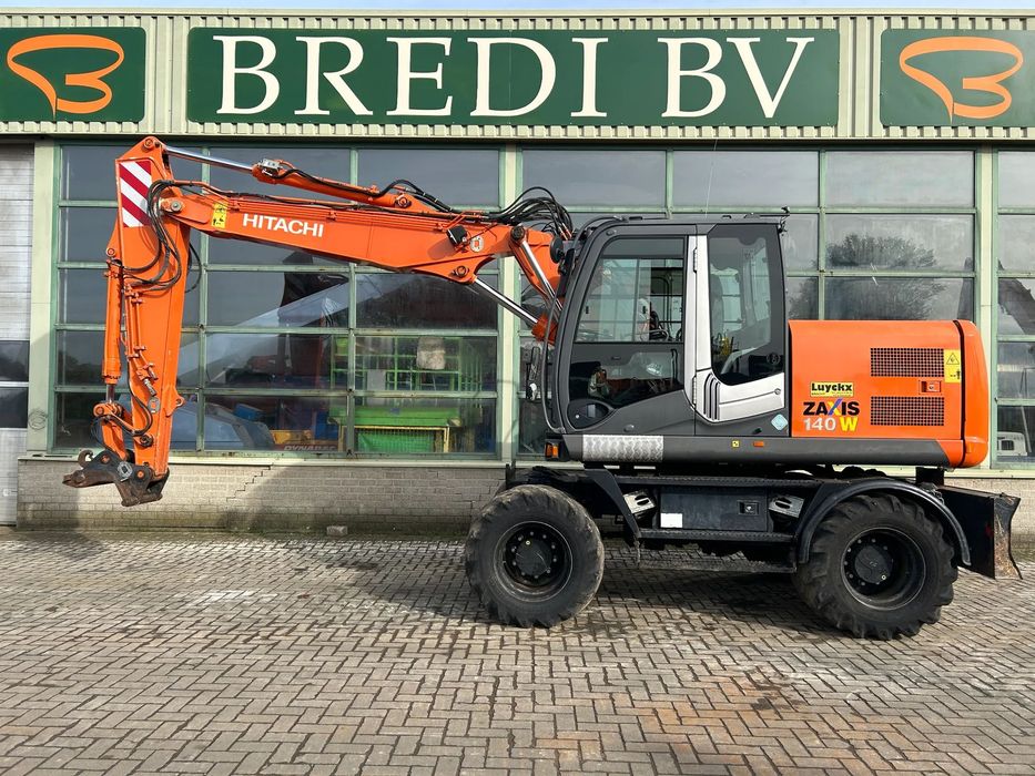 Hitachi ZX140W-3 Excavator pe pneuri HITACHI