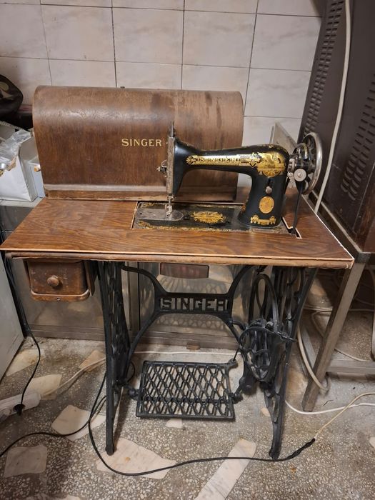 Mașină de cusut Singer