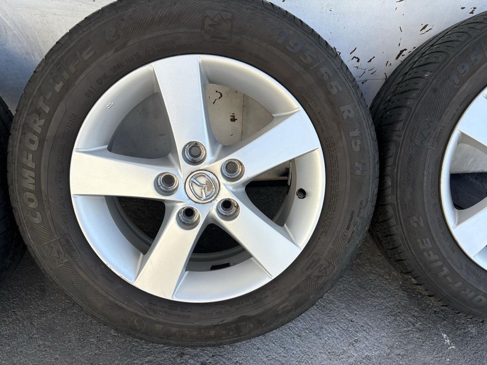 4бр. Алуминиеви джанти с гуми 195/65 R15цола от Mazda  5x114.3