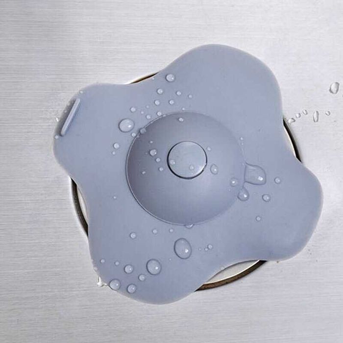 Capac de scurgere de cauciuc