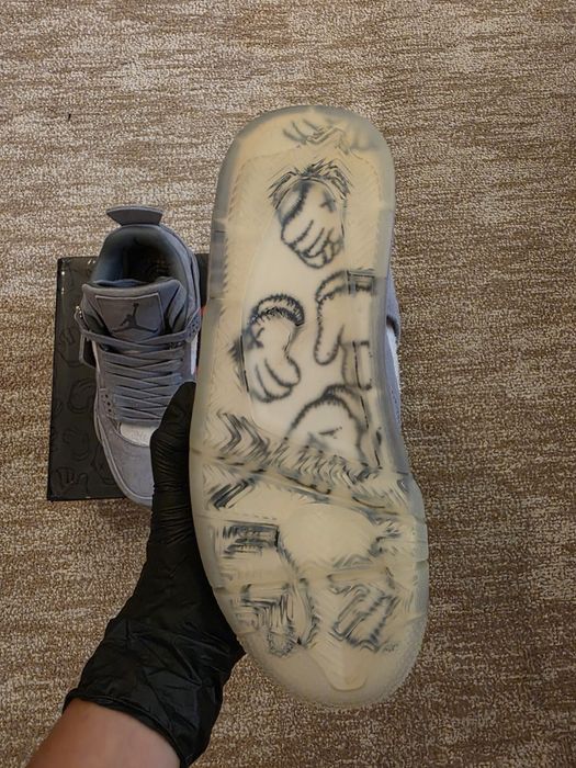 Jordan 4 Kaws.