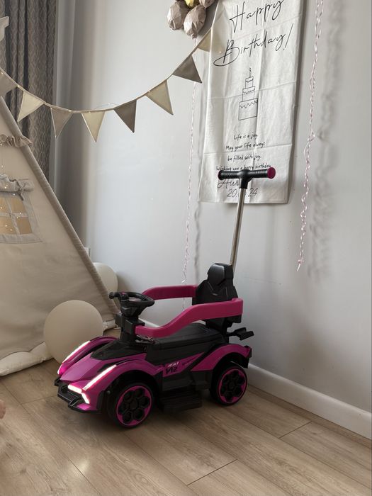 Машина-каталка с ручкой розовый фиолетовый