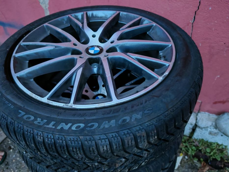 Cauciucuri iarna plus jante BMW