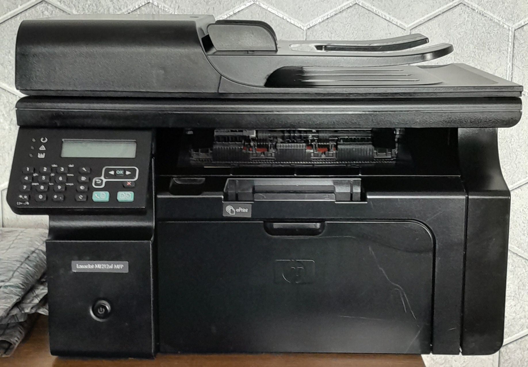 Принтер/Сканер/Копир/HP LaserJet M1212nf/А4