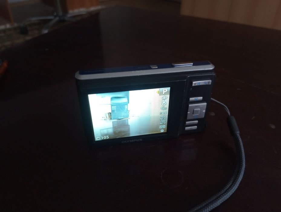 Olympus X-940, 14 MP, 4x optical zoom, digitală