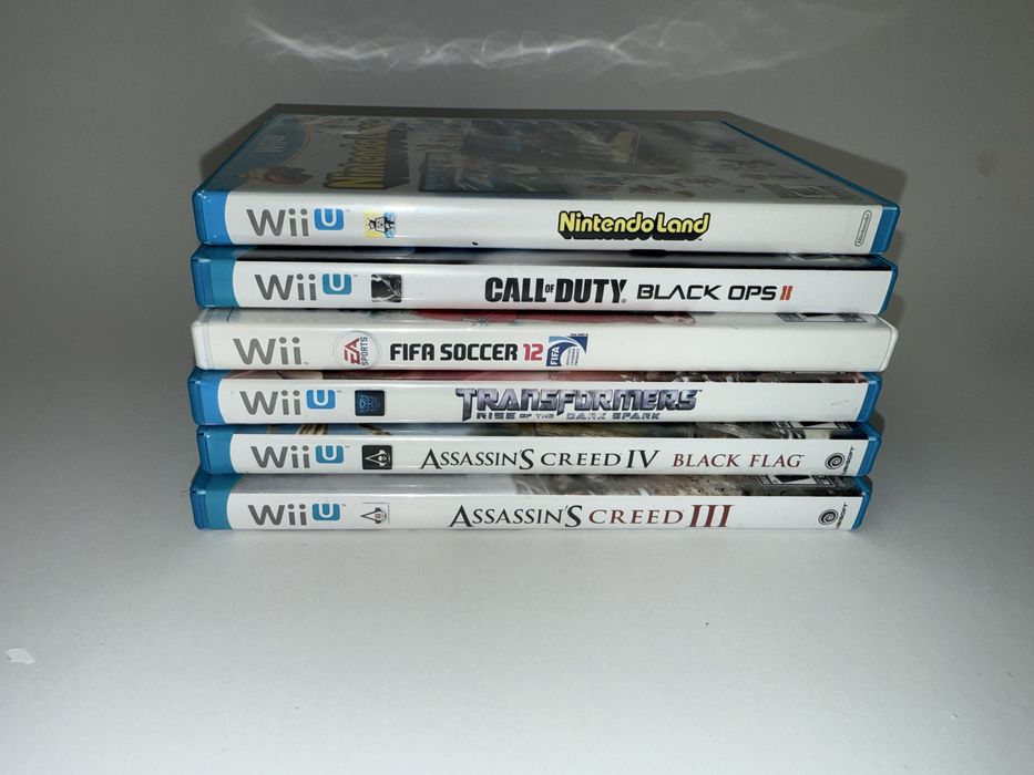 Nintendo Wii U plus packet de jocuri si extra remote