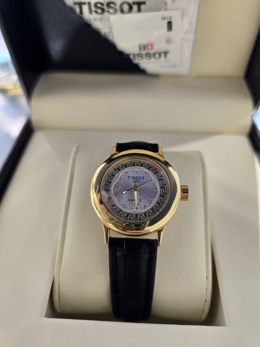 Женские золотые часы Tissot 750 пробы.