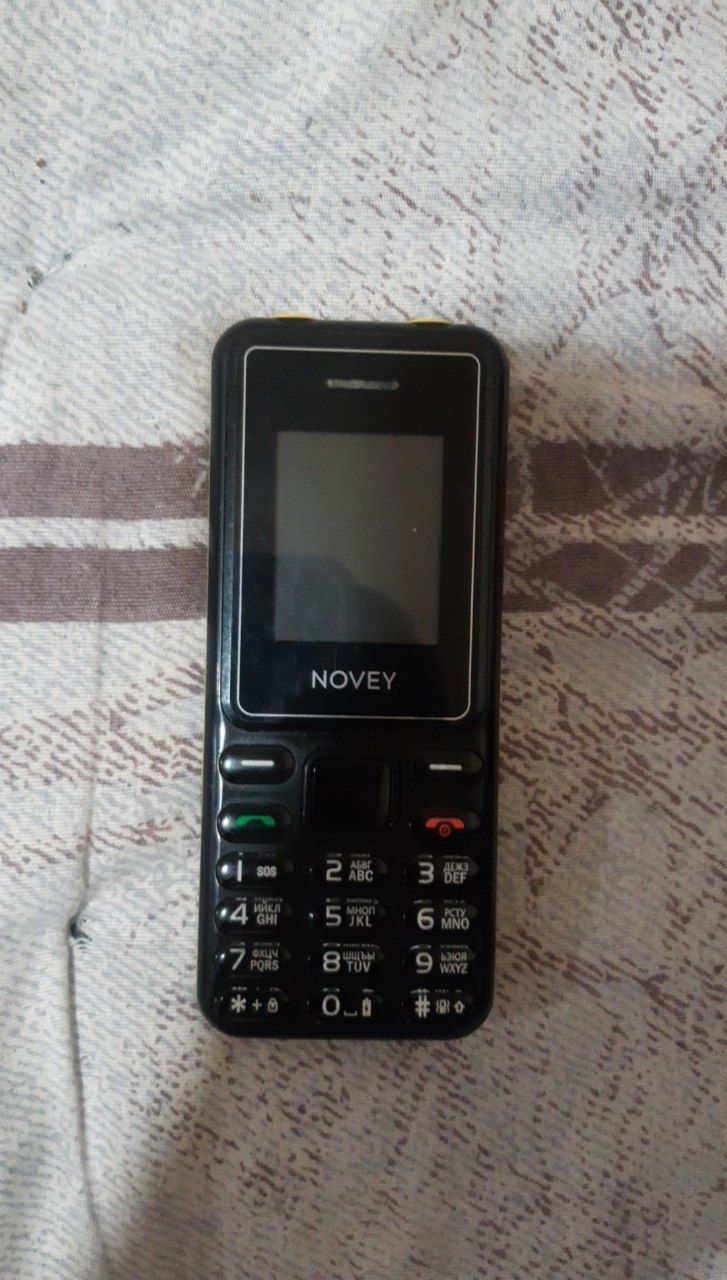 Novey knopkali telefon