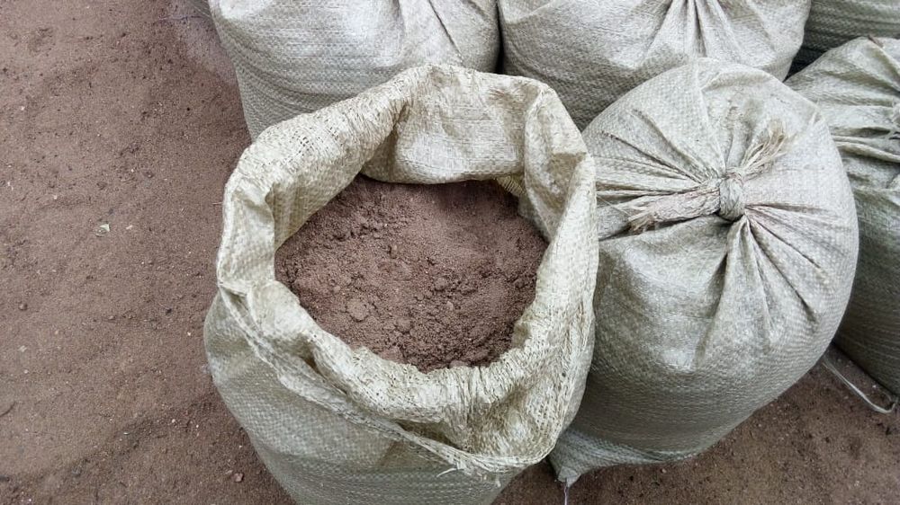 Глина красная печная в мешках