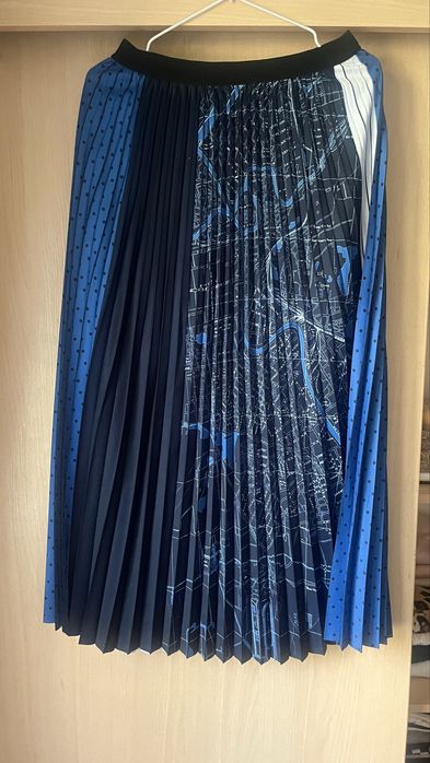 Юбка длини миди