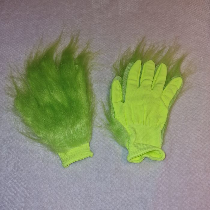 Manusi Grinch imblanite