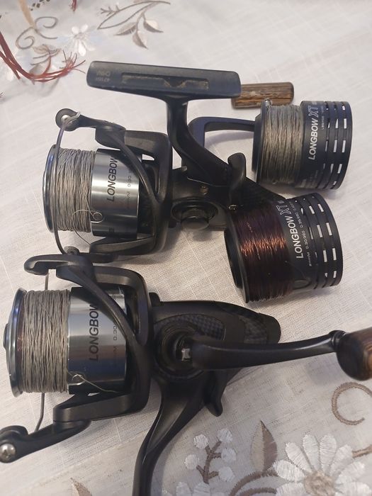 Vând două mulinete Okuma Longbow