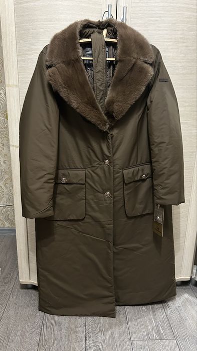 Продам новую куртку.  50 размер, наполнитель верблюжья шерсть, норка