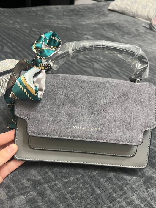 Йенги сумка ишлатилмаган