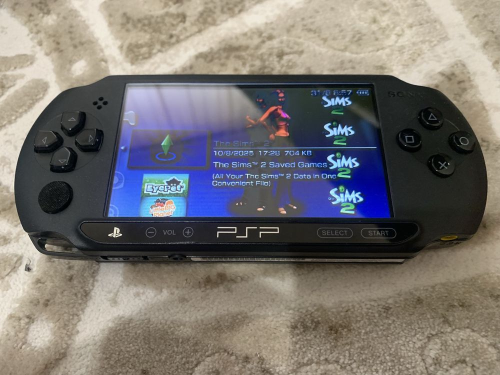 Sony PSP Street (PSP-E1000) portable game console in its carrying case