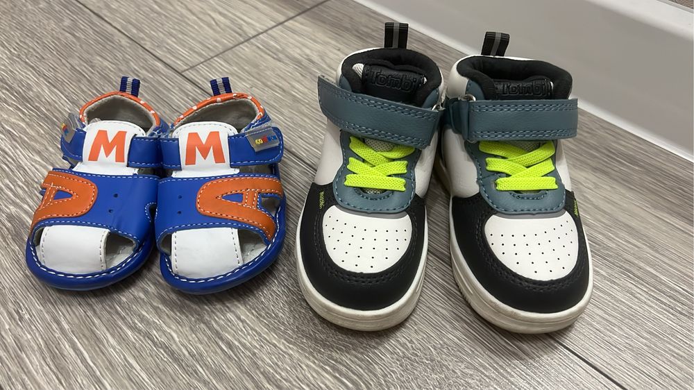 Продам на мальчика осенние ботинки сандали,кроксы,новый комбинезон