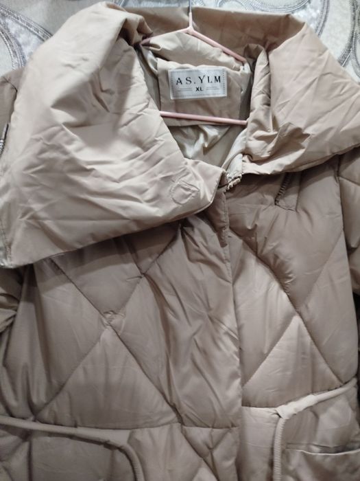 Женская куртка…….