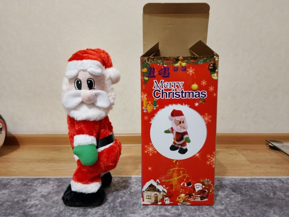 Танцующий Игрушечный дед Мороз